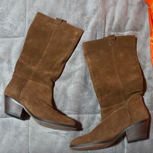 Genuine Cowboy boots - stitching is superb! Very comfy and cute!